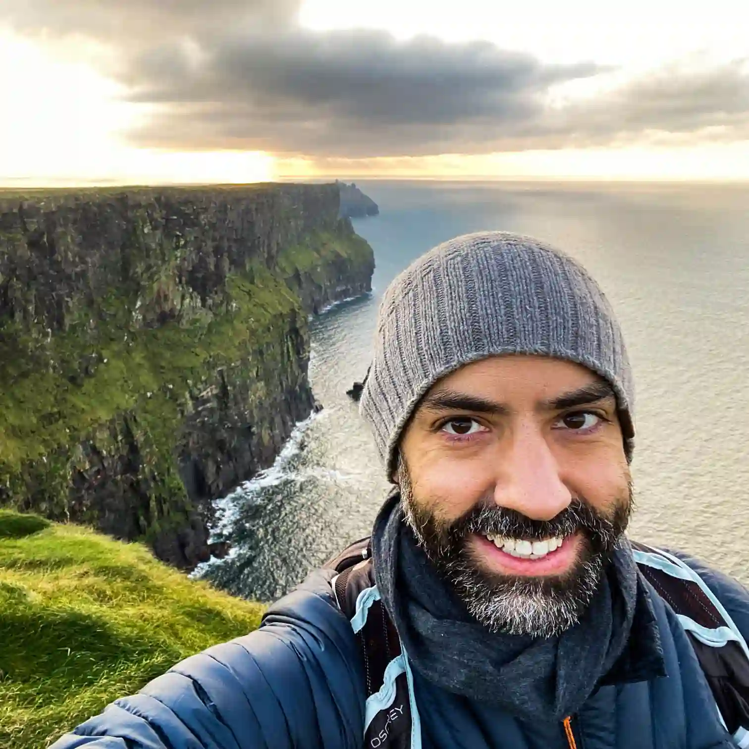 Jay Salois Standing on the Cliffs of Moher site in Ireland